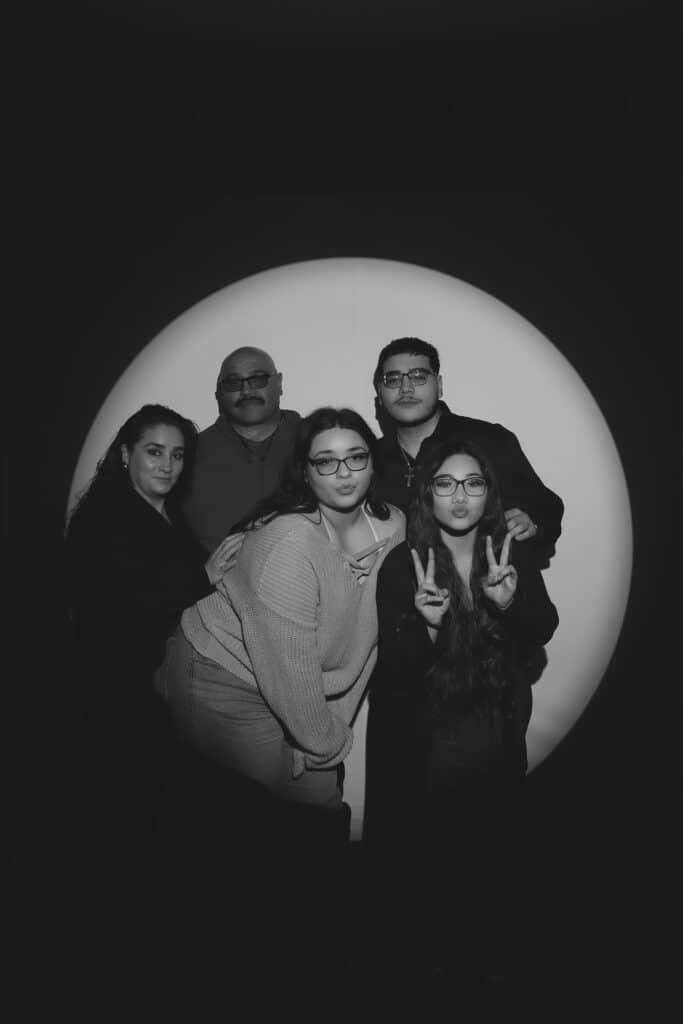 Teen celebrating an 18th birthday with friends, captured at a private party.