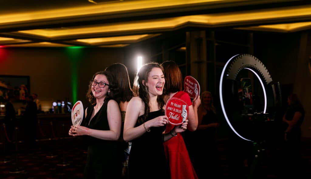 Event guests using a 360 Video Booth to capture dynamic and engaging video moments.