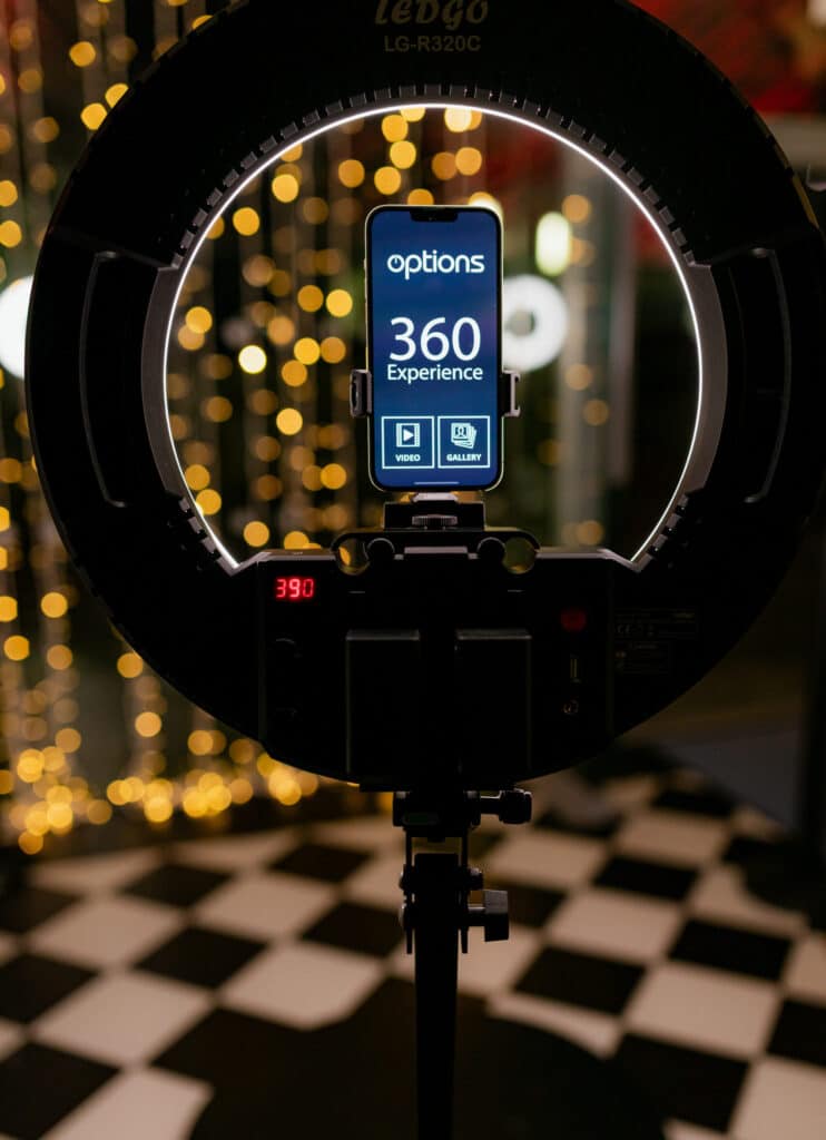 Attendees interacting with a 360 Video Booth for fun, memorable video content.