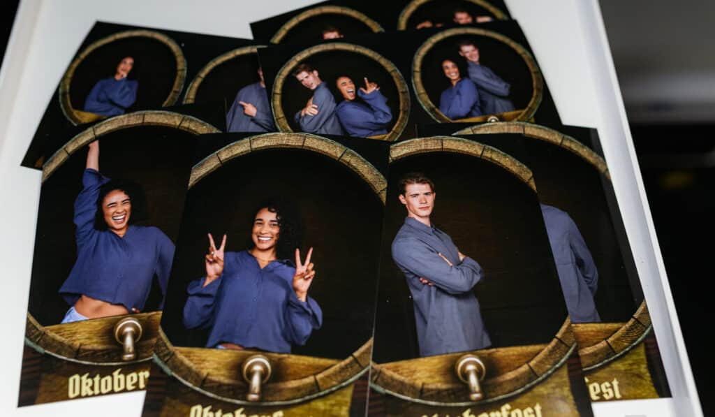 Guests enjoying an AI Photo Booth Experience at a corporate or party event, capturing creative photos.