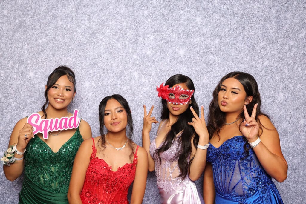 A memorable prom night with students posing for photos and enjoying the event.