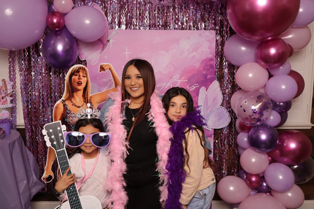 Attendees celebrating a private party, capturing memories with fun photos.