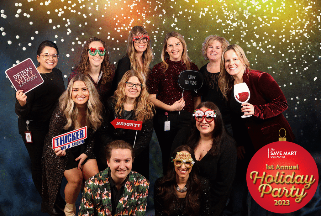 A Christmas-themed Save Mart event setup with vibrant decorations and holiday cheer.