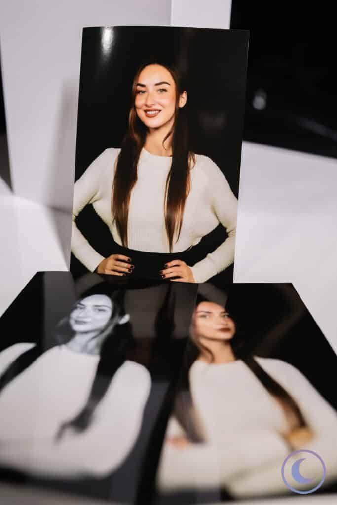 Professional printed portraits of woman in white sweater created with Luna Events Headshot Booth