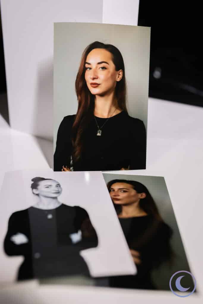 Professional printed headshots of woman in black shirt taken with Luna Events Headshot Booth