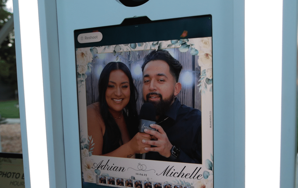 Confessional Booth screen displaying a playback of a recorded video message with a custom wedding-themed overlay.